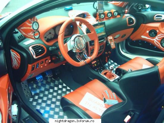 Salutare la toti nebunii cu masini tunate..ca io detin una..:P - pozele astea sunt ptr - Auto Tuning